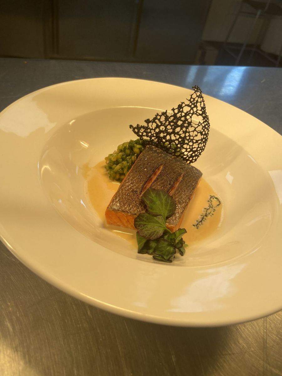 Trout with a lace tuile and peas